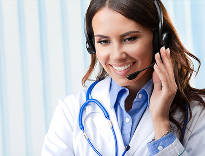 Health insurance specialist with headset and stethoscope